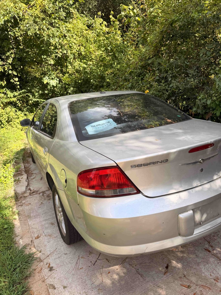 Silver Chrysler Sebring sedan we bought for cash